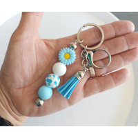 Sleutelhanger met kralen en kwastje | bloem | blauw